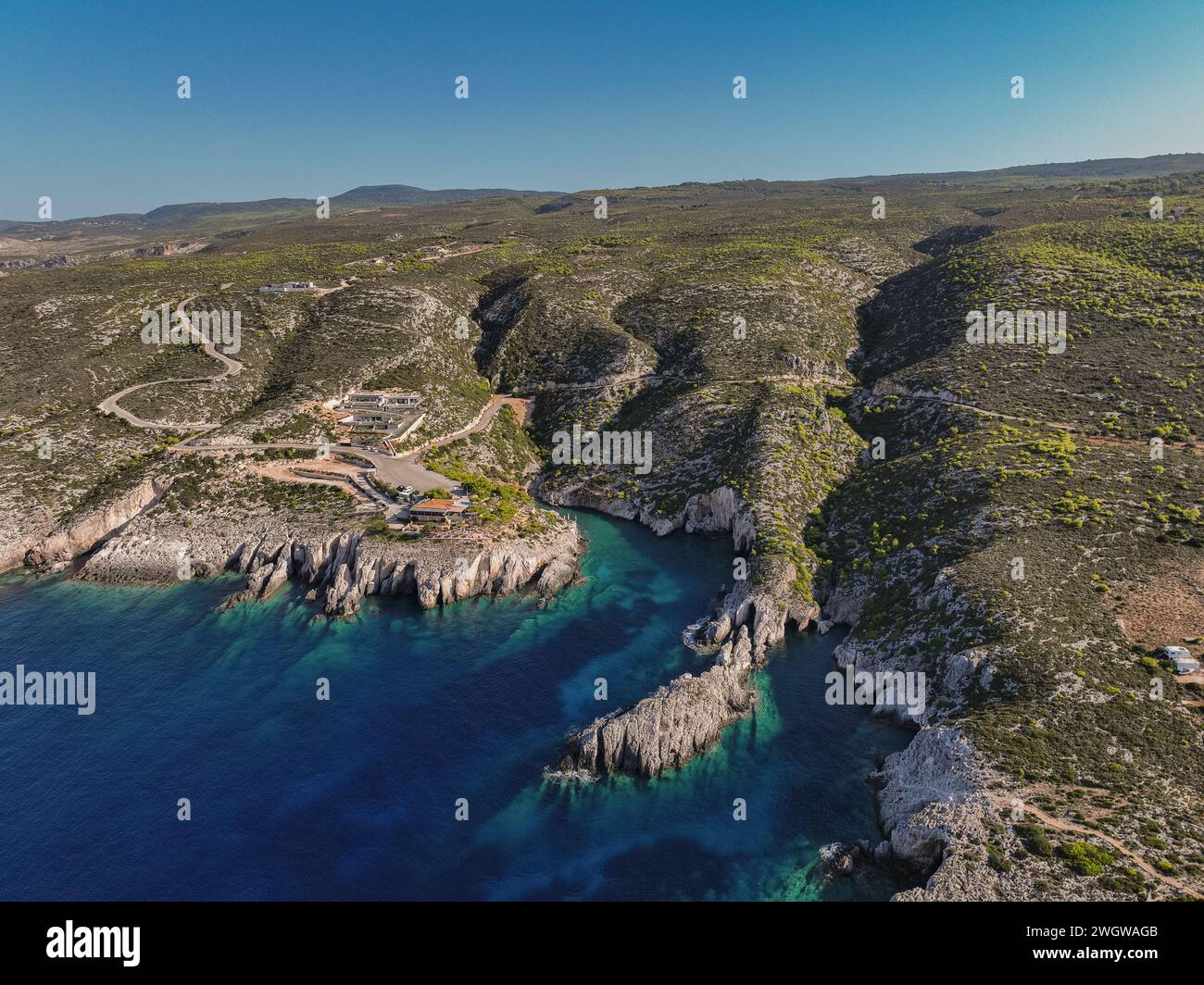 Porto Limnionas Beach Zakynthos Greece. Aerial drone View Of Porto Limnionas Beach In Zakynthos Island Greece. Vacation turquoise sea and green rock c Stock Photo