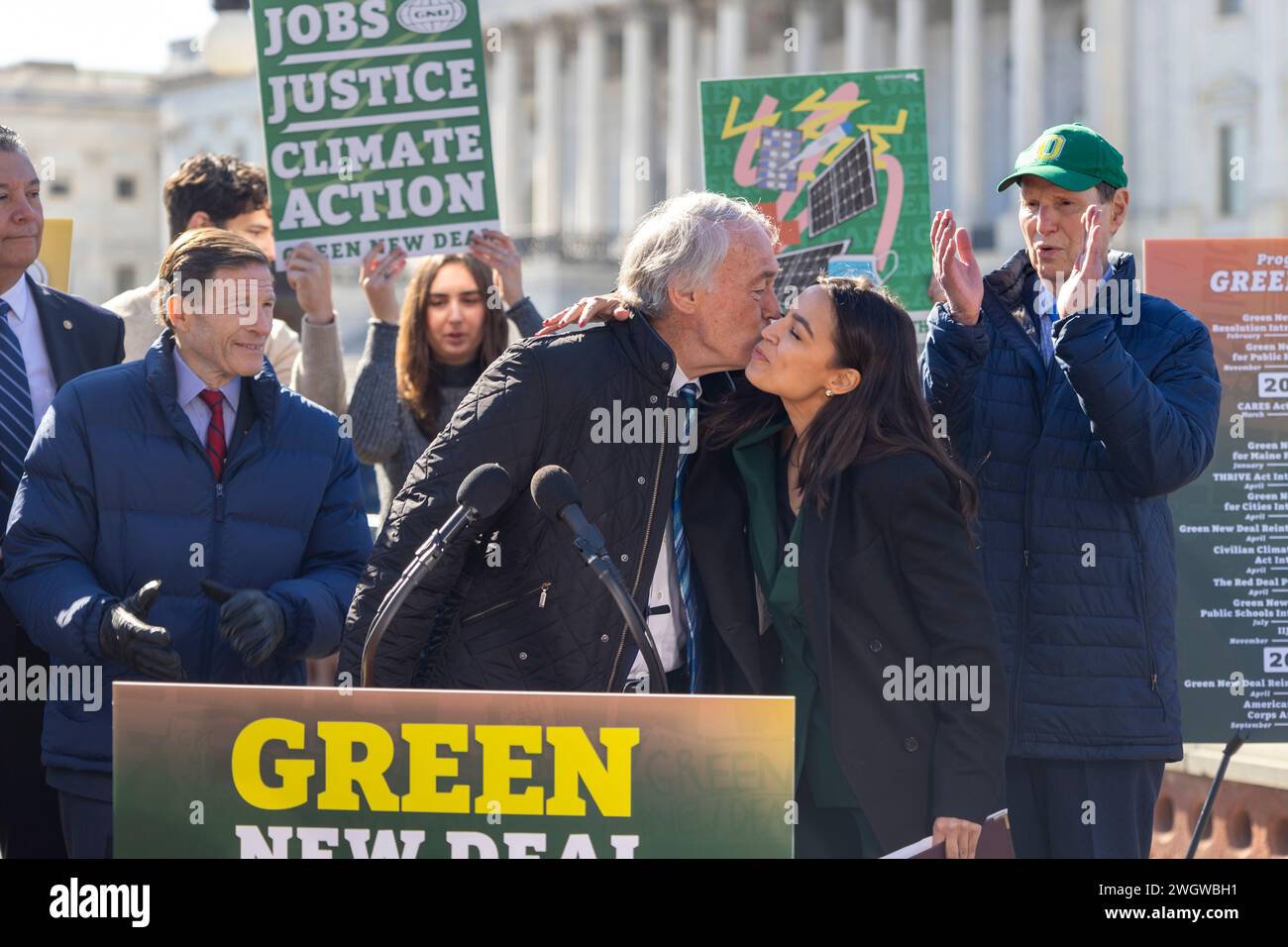 Washington, District Of Columbia, USA. 6th Feb, 2024. Senator Edward J. Markey (D-MA.), center, and Congresswoman Alexandria Ocasio-Cortez (D-NY) were joined by labor, health, and climate justice advocates in celebrating the reintroduction of the Green New Deal Resolution Tuesday, Feb. 6, 2024 in Washington. The Green New Deal proposes to tackle the climate crisis with a 10-year mobilization that puts millions of Americans to work in good-paying, union jobs. Similar to FDRÃs New Deal, these jobs would be focused on strengthening the nationÃs public infrastructure as well as tackling pollu Stock Photo