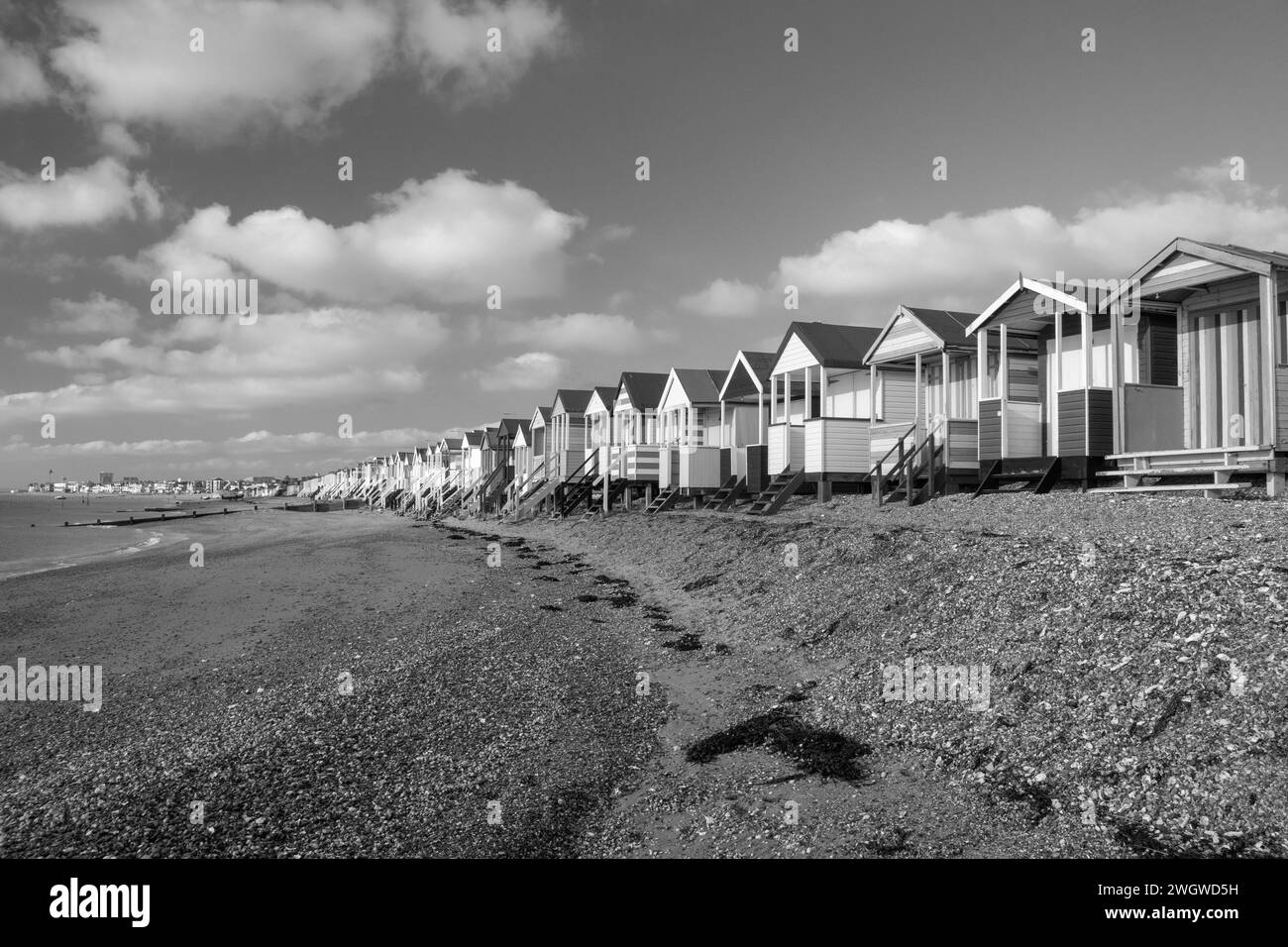 Black and white image of beach huts at Thorpe Bay, near Southend-on-Sea, Essex, England, United Kingdom Stock Photo