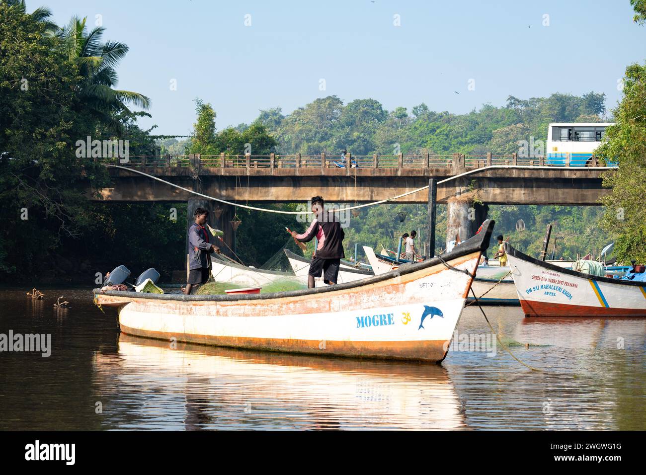 Agonda, Goa, India, Fisherman in the boat at a lagoon of Agonda beach, Editorial only. Stock Photo