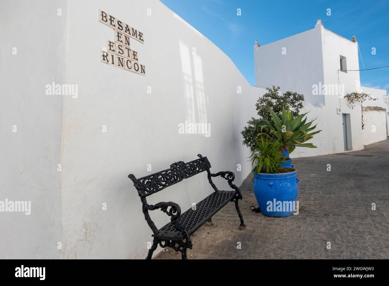 Nice corner located on a street in Vejer de la Frontera, called Besame En Este Rincon (Kiss Me In This Corner). Spanish culture, Stock Photo