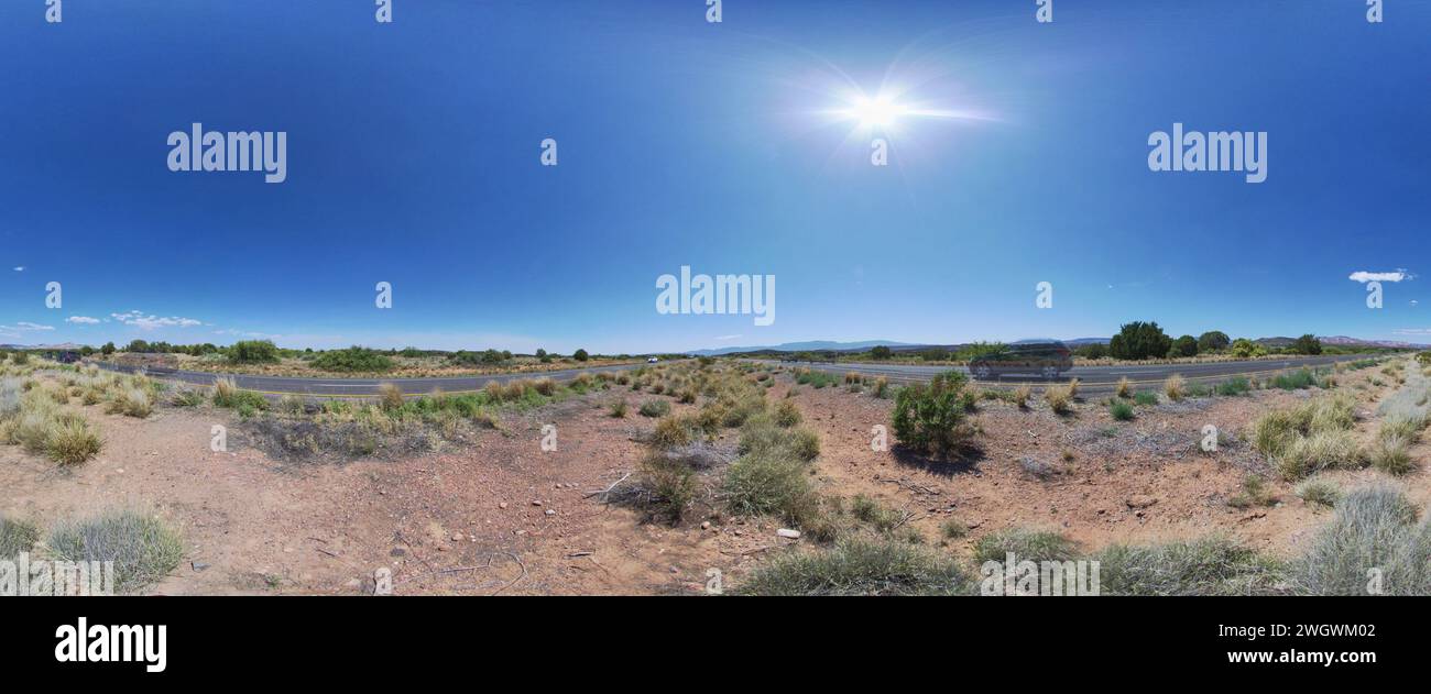 Panoramic Desert Roadside Under Noon Sun, Arizona Stock Photo