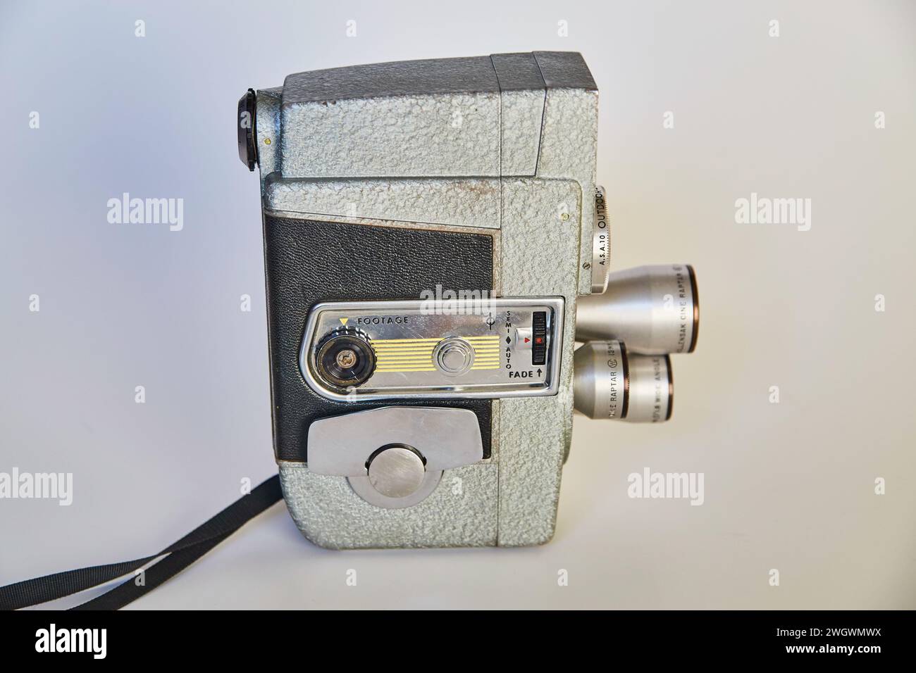 Vintage Super 8 Film Camera with Dual Lenses on Gray Background Stock Photo