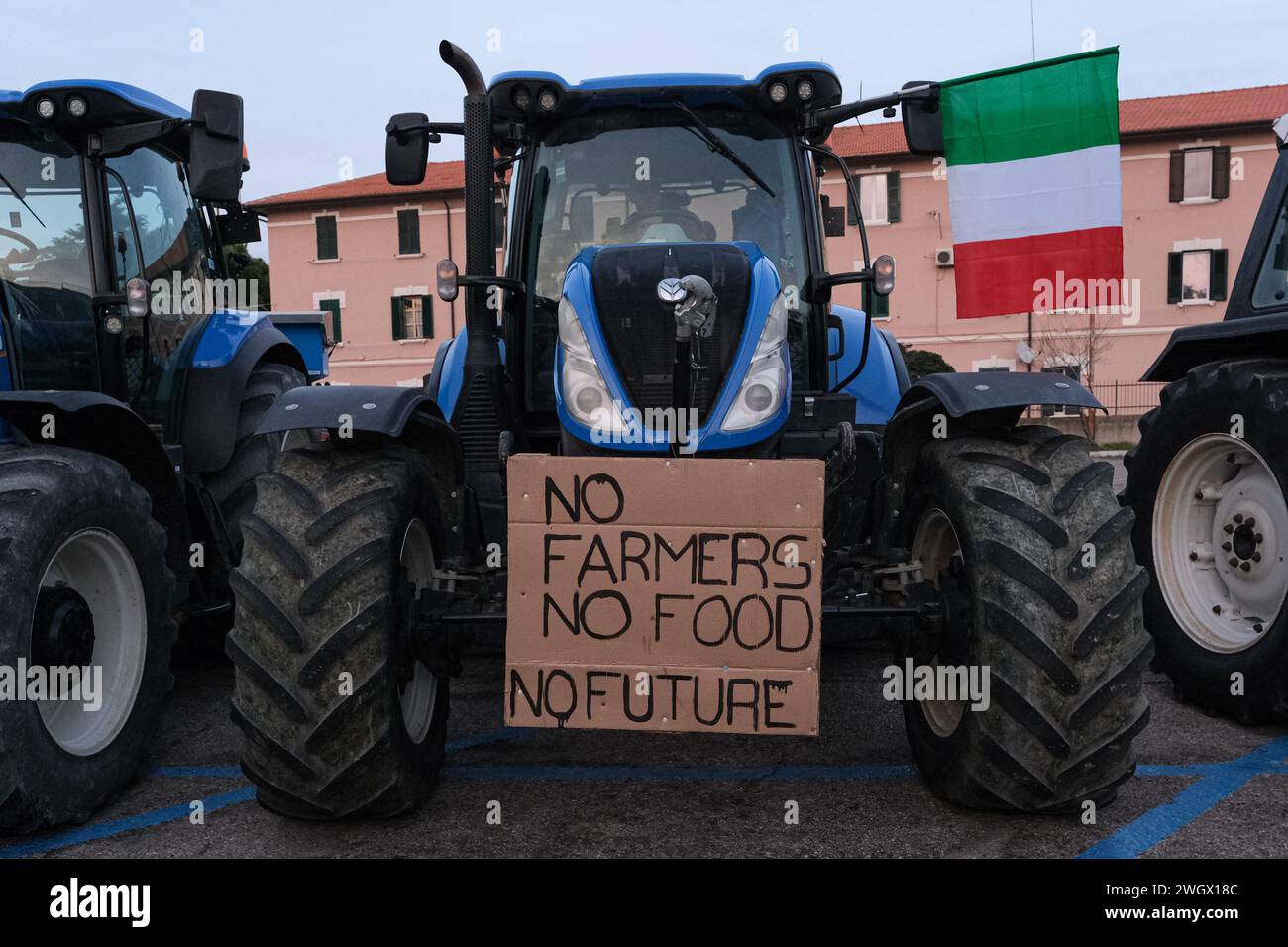 Tractor with a sign that says: 'No Farmers no food no future'. The protests of the farmers who garrisoned Piazza Donatori di Sangue in the centre of T Stock Photo