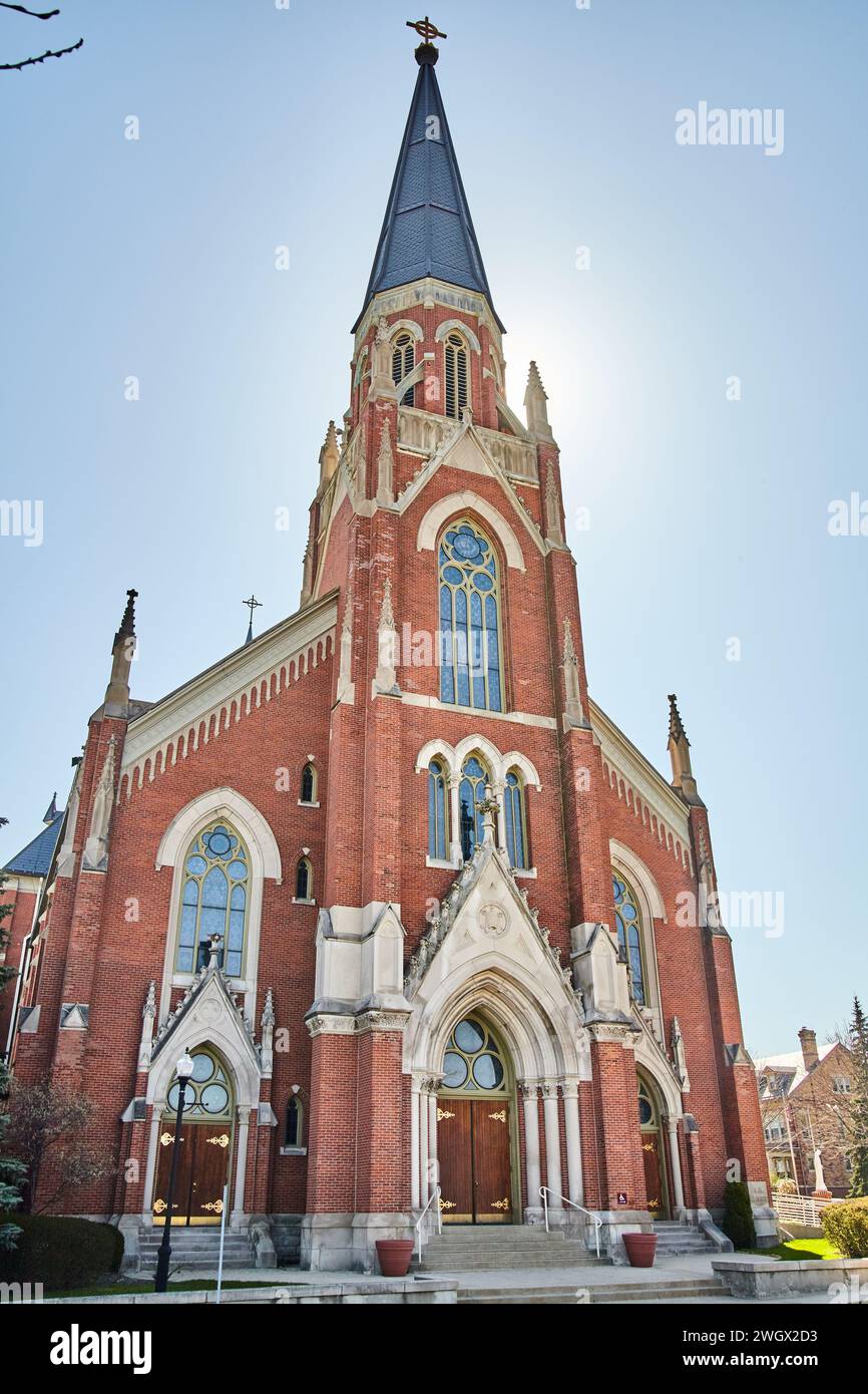 Gothic Church Architecture and Sunny Blue Sky, Low Angle View Stock Photo