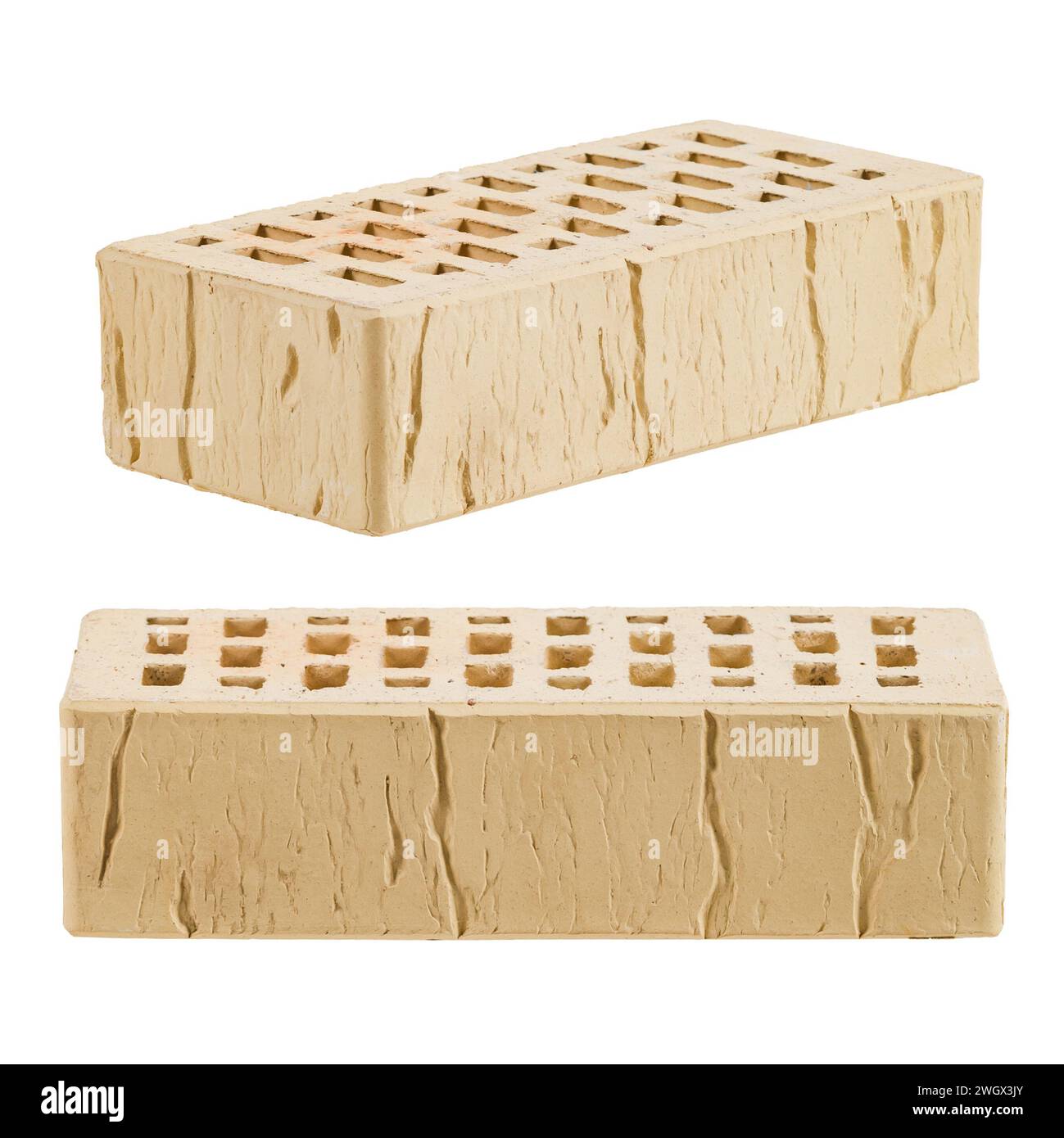 Yellow ceramic brick is isolated on a white background. Decorative pattern is old cracks. Stock Photo