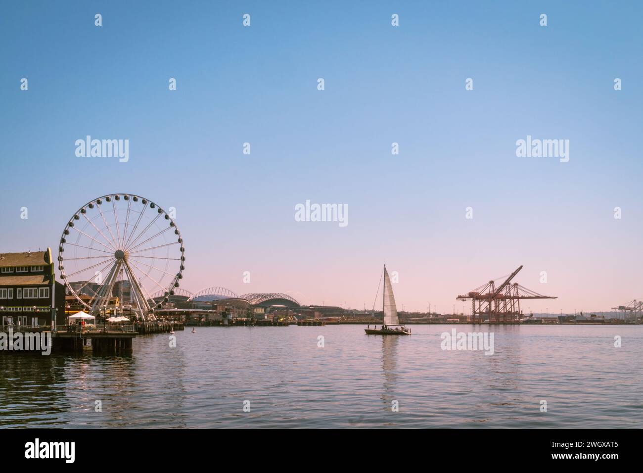 Seattle skyline with Waterfront neighborhood and ferris wheel in foreground. Stock Photo
