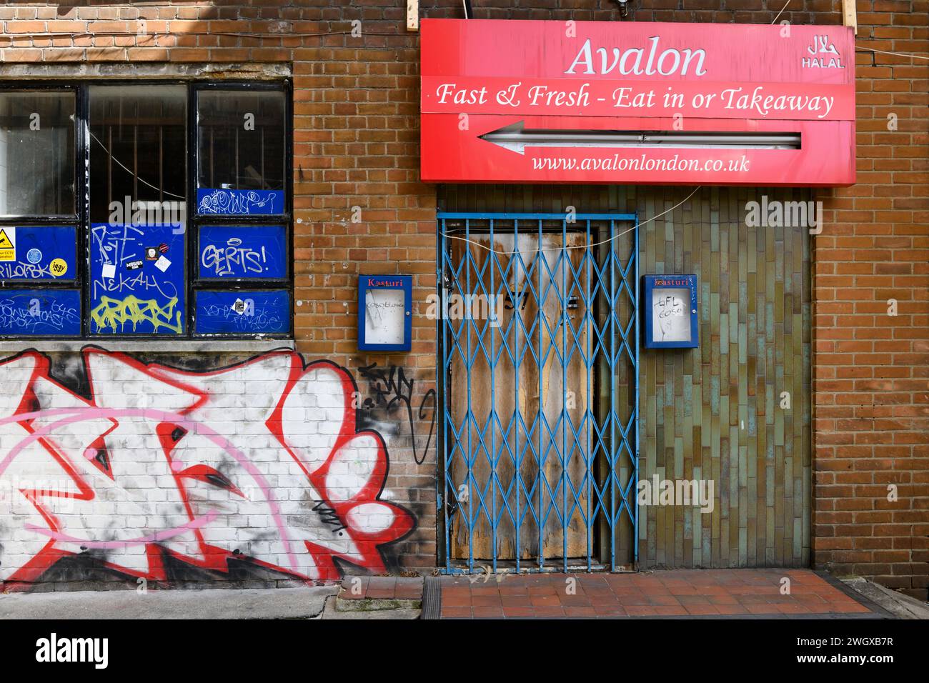 Graffiti on closed down business, Little Somerset Street, City of London, UK.  7 Apr 2023 Stock Photo