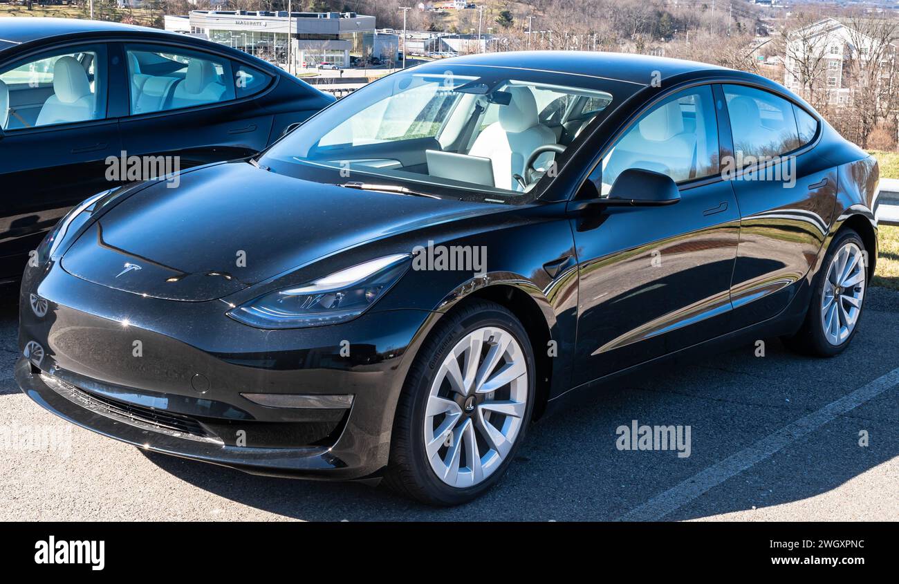 A Tesla electric vehicle for sale at a dealership Stock Photo Alamy