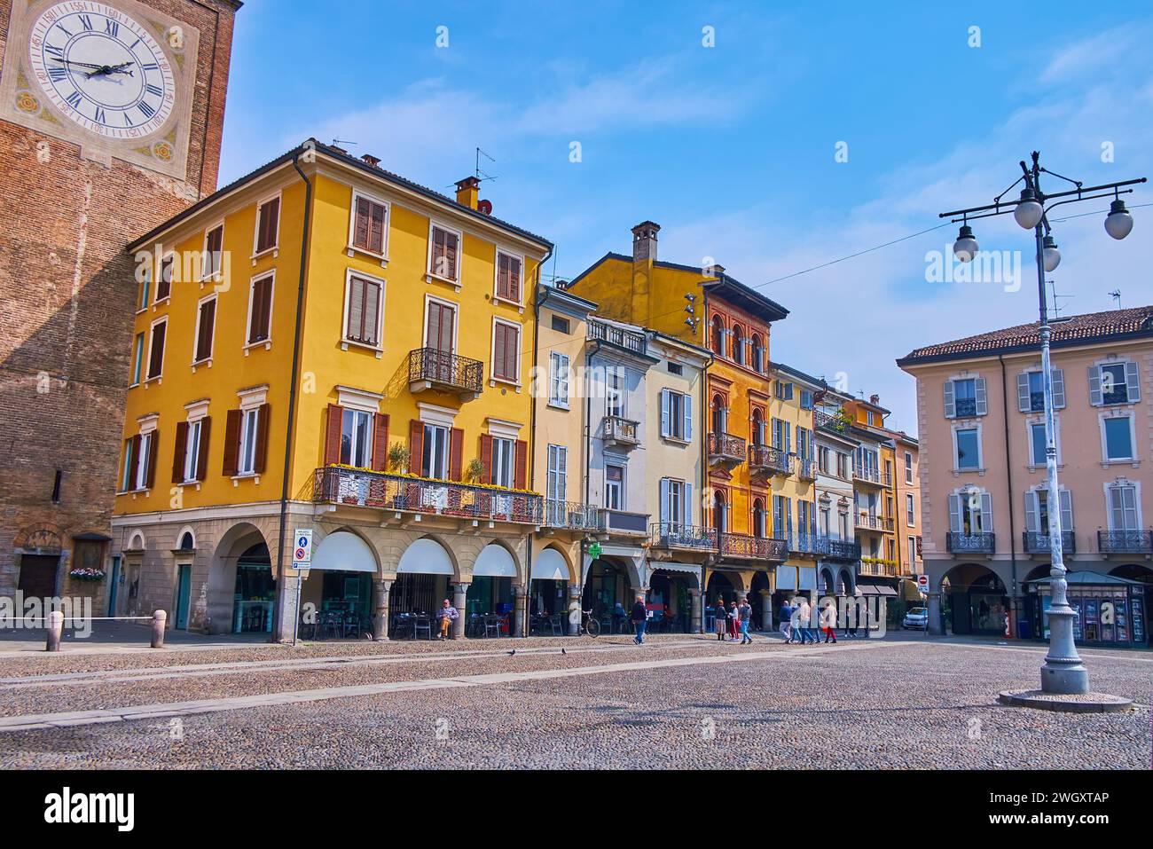 Piazza della Vittoria Square with colored historic houses, stores and restaurants, Lodi, Lombardy, Italy Stock Photo