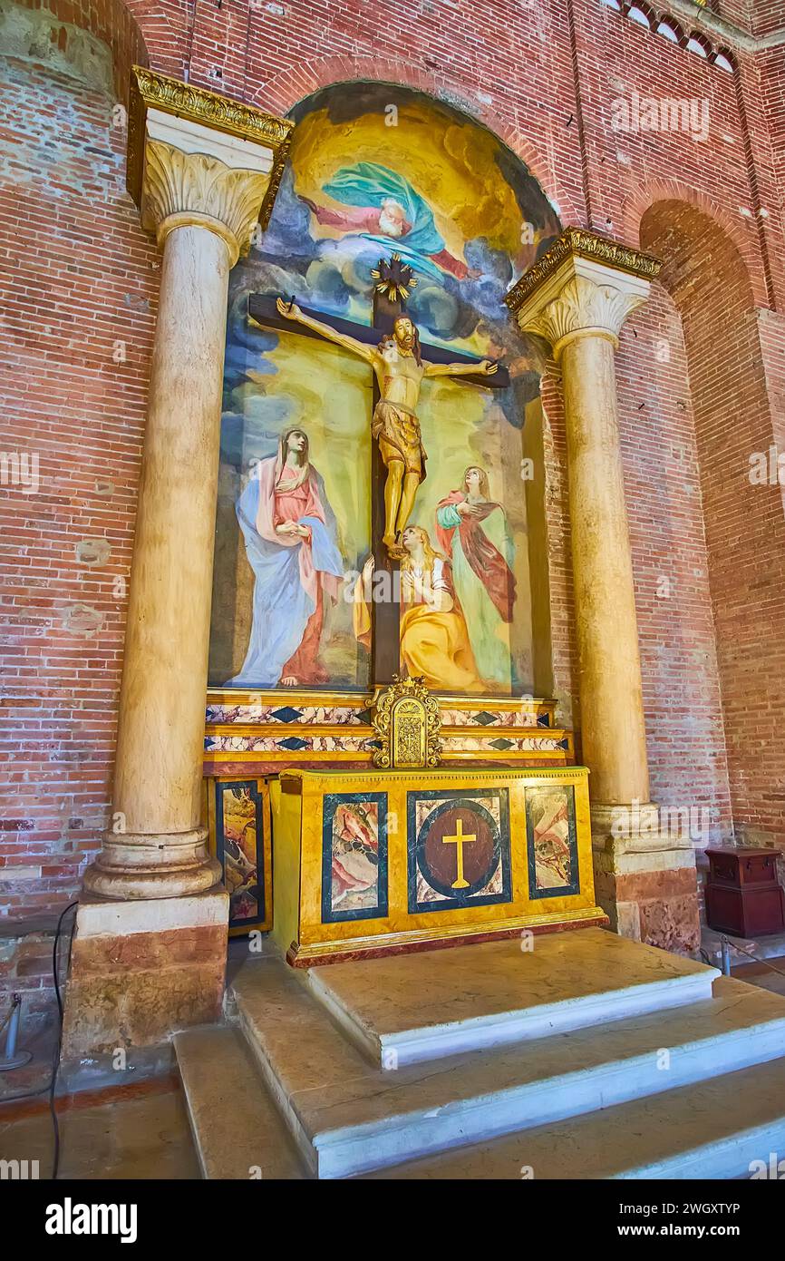 CREMONA, ITALY - APRIL 6, 2022: Baptistery interior with medieval frescoed Altar of the Crucifix, Cremona,  Italy Stock Photo