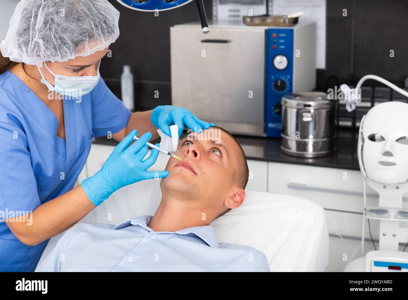 Person Getting Face Injection Man getting injections face hi-res stock photography and images - Alamy