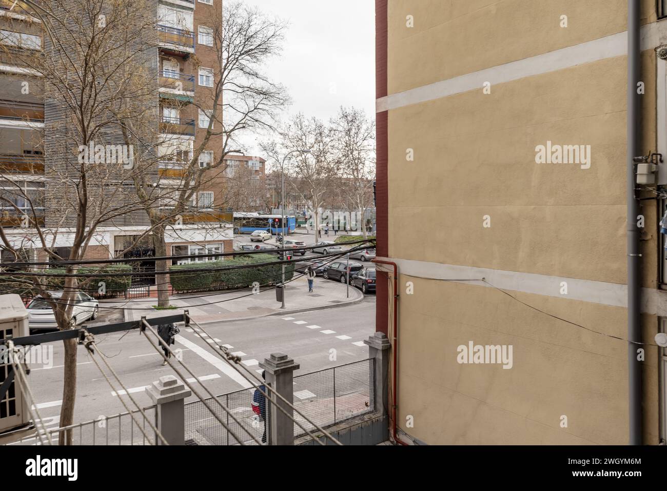 Views of a street with a pedestrian crossing and many parked cars Stock ...