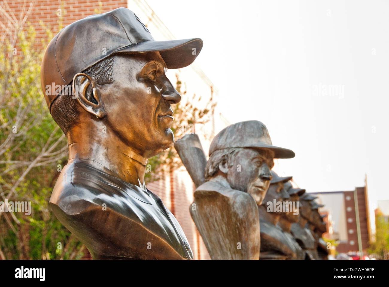 seven bronze busts of Oklahoma's greatest baseball players - Allie Reynolds, Bobby Murcer, Pepper Martin in front of Chickasaw Bricktown Ballpark Stock Photo