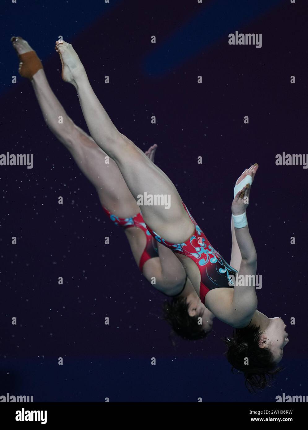 (240207) DOHA, Feb. 7, 2024 (Xinhua) Chen Yuxi (R)/ Quan Hongchan