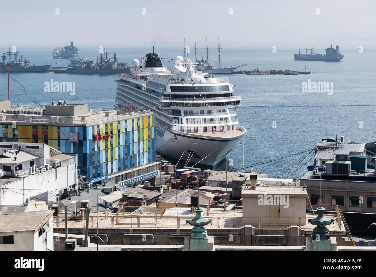 Valparaiso's iconic port welcomes majestic cruise ships. Stock Photo