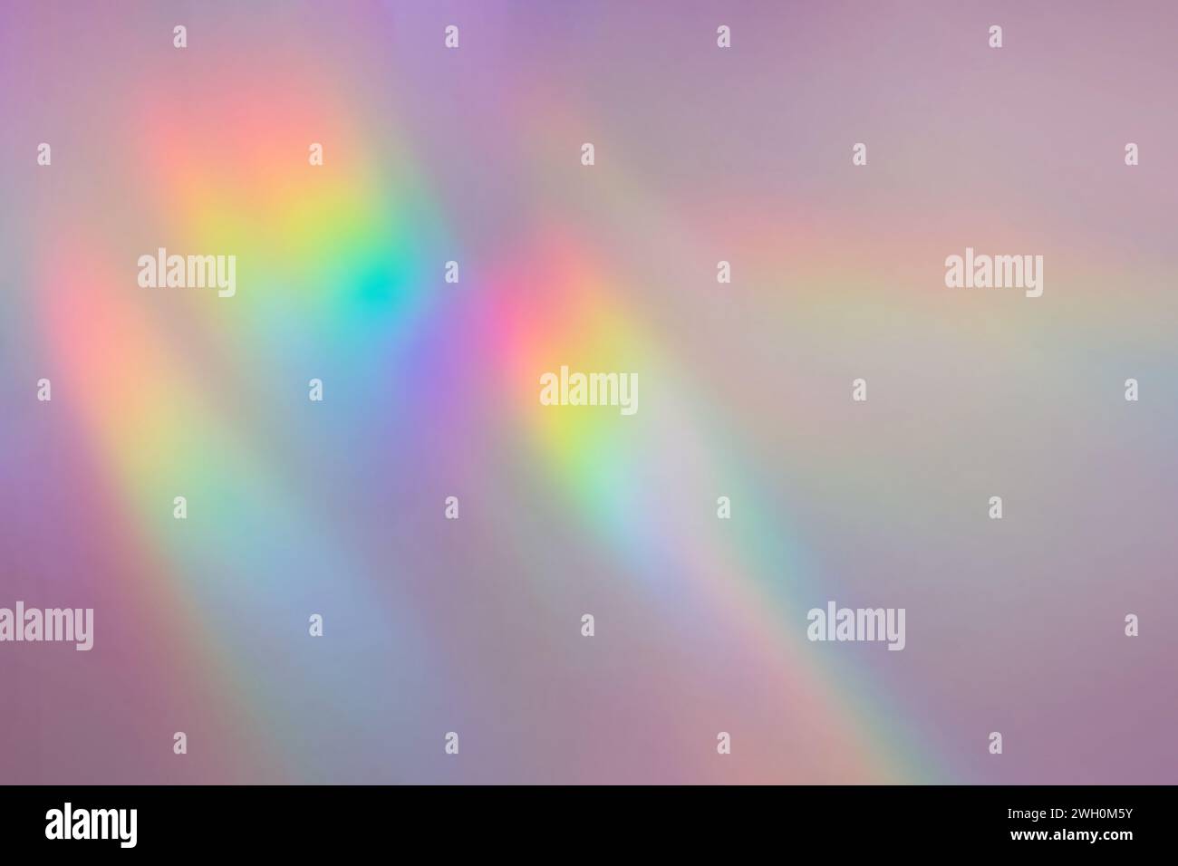 Abstract blurred rainbow background, light refraction, pastel tones Stock Photo