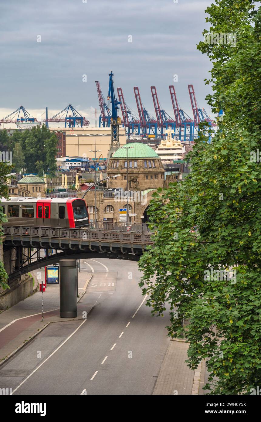 Hamburg Germany, city skyline at St. Pauli Landing Bridges (Landungsbrucken) pier and Hamburg harbour with metro train Stock Photo