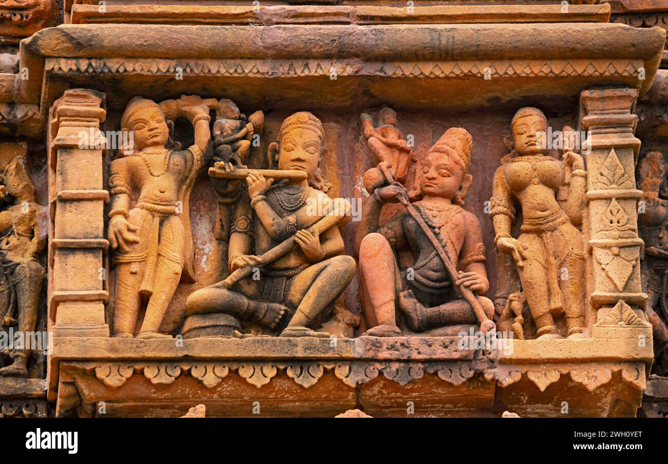 Sculpture of Lord Krishna With Mira on the Sun Temple, 11th Century Temple, Jhalarapatan, Rajasthan, India. Stock Photo