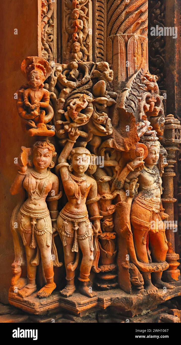 Sculptures of women and Doorkeeper of Temple, Chandrabhaga Temple, Jhalarapatan, Rajasthan, India. Stock Photo