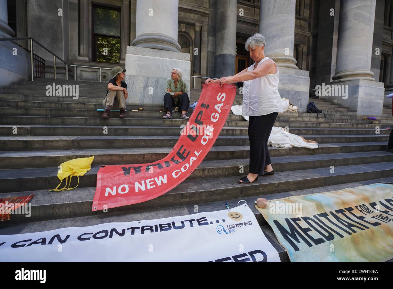 Adelaide SA Australia 7 February 2024 Climate Activists Unfurl Banners   Adelaide Sa Australia 7 February 2024 Climate Activists Unfurl Banners On The Steps Of The South Australian Parliament To Protest Against Extracting Coal And Gas And Fossil Fuel Projects Credit Amer Ghazzalalamy Live News 2WH10EA 