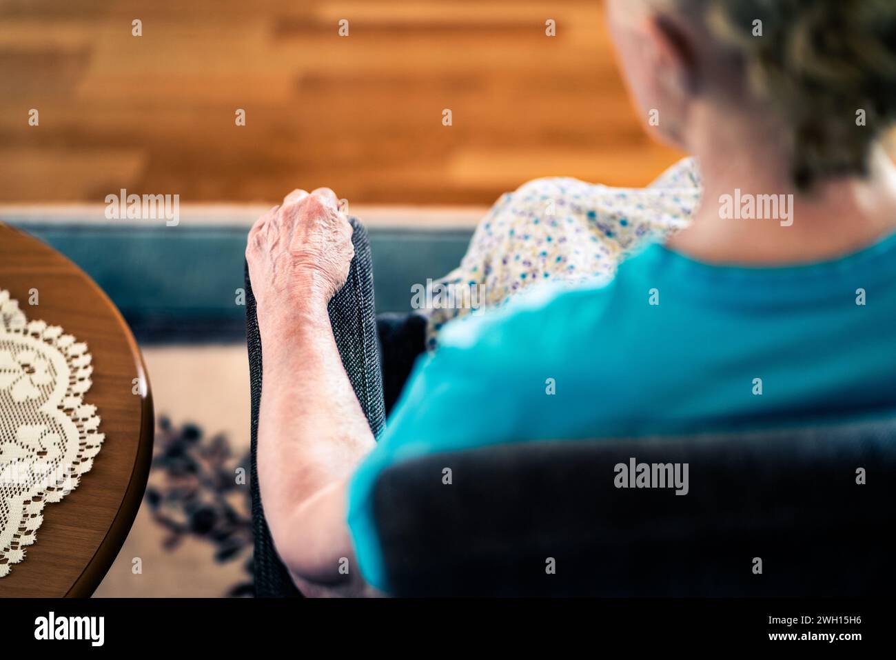 Rheumatoid arthritis. Joint pain in hand. Old senior woman. Mature lady