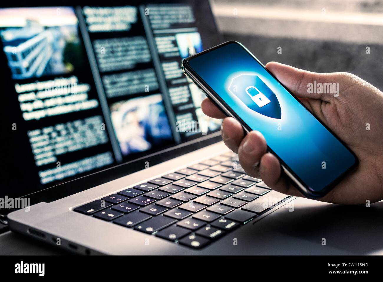 Phone data cyber security to protect from hacker or fraud. Website service attack safety for mobile and laptop computer. Cybersecurity. Stock Photo