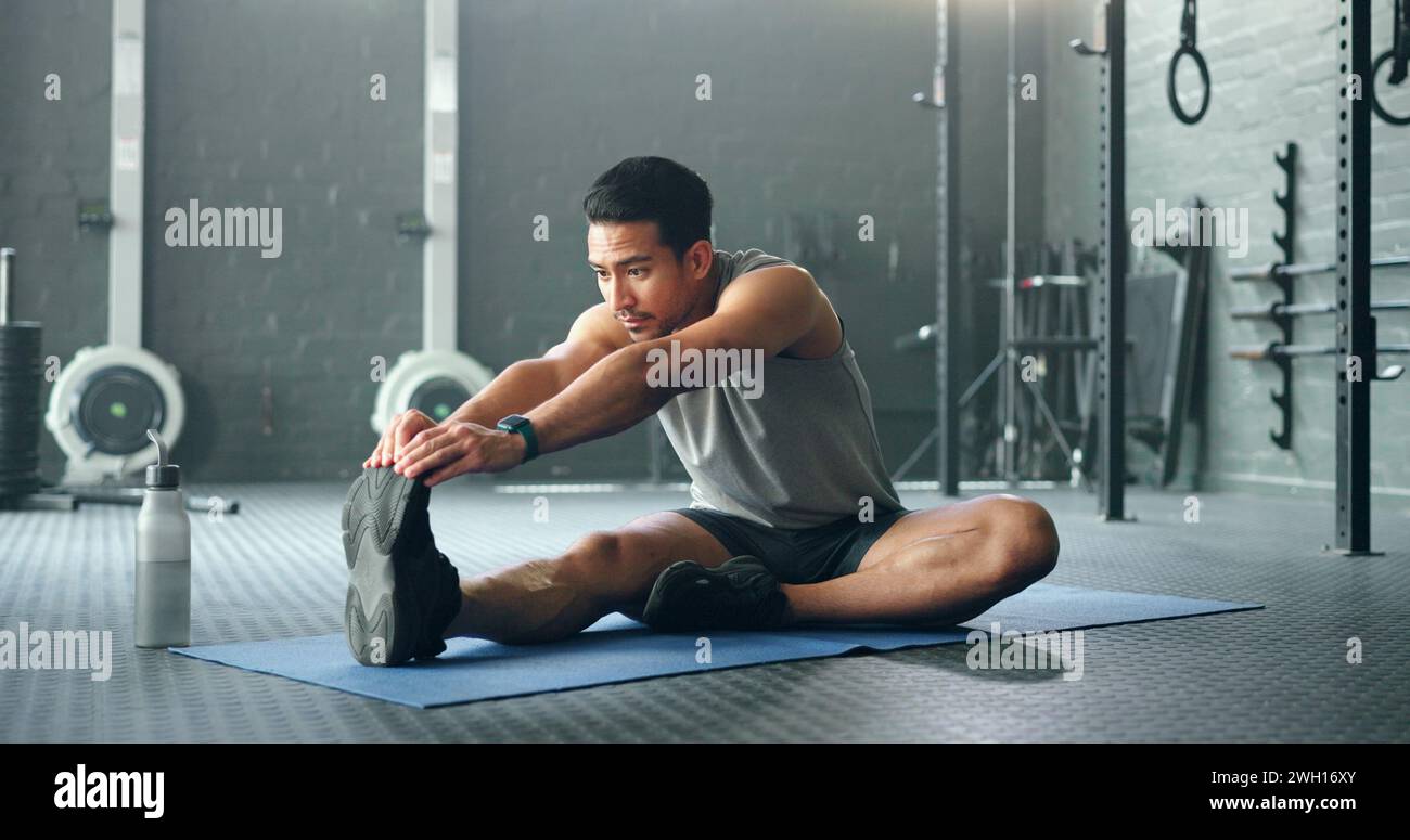 Active person stretching body muscles hi-res stock photography and ...