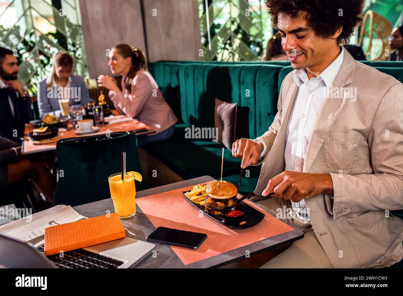 businessman-having-lunch-in-restaurant-stock-photo-alamy
