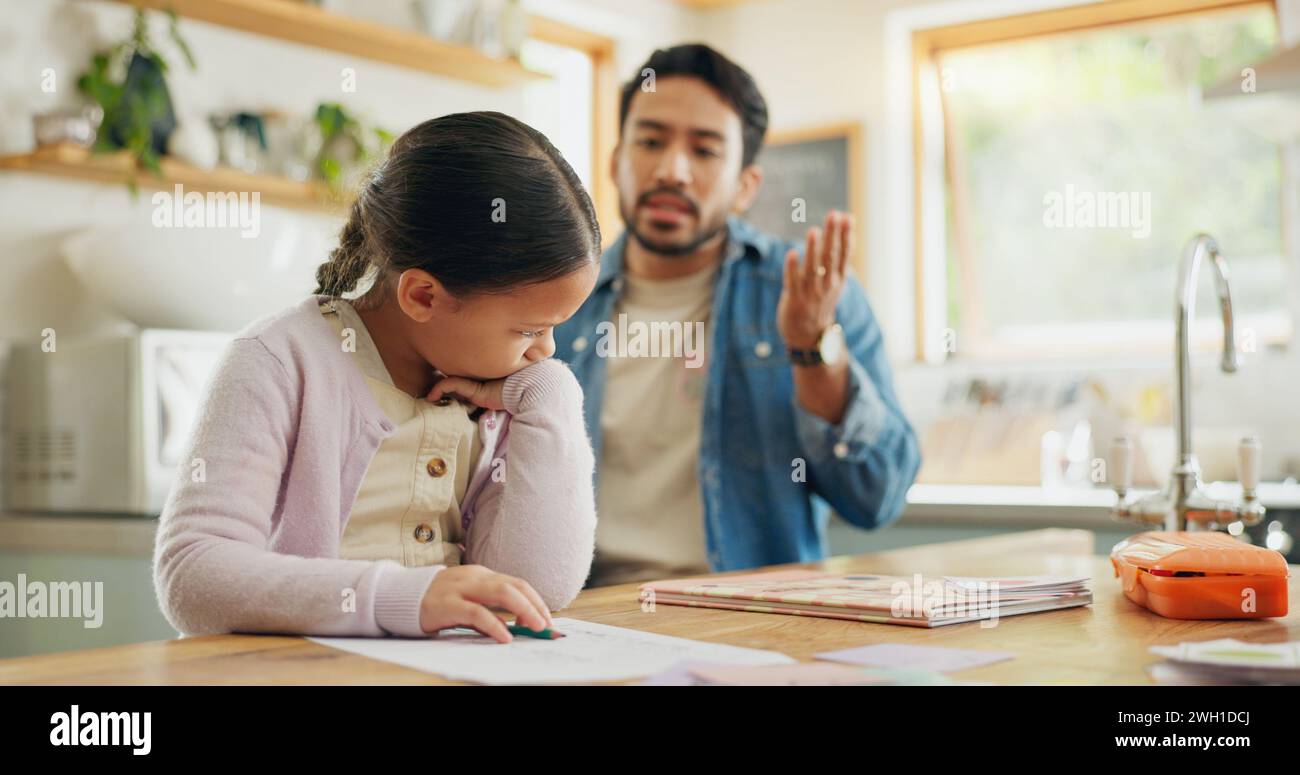 Angry dad with crying child, homework and scolding in kitchen, helping to study with conflict. Learning, teaching and frustrated father with sad Stock Photo