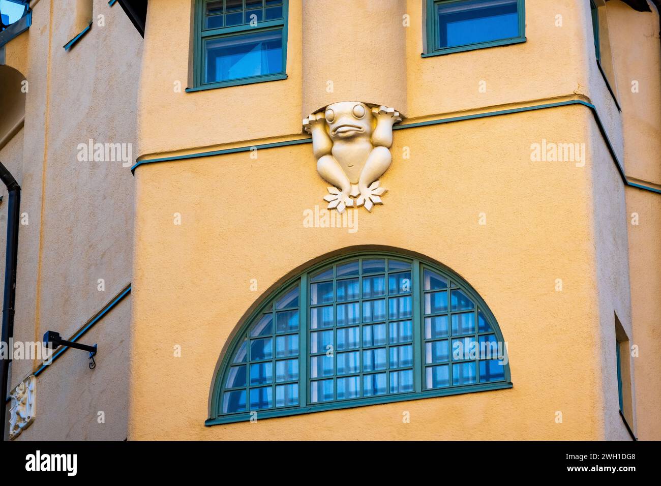 Frog on the facade of an art nouveau building in the Design District of Helsinki, Finland Stock Photo