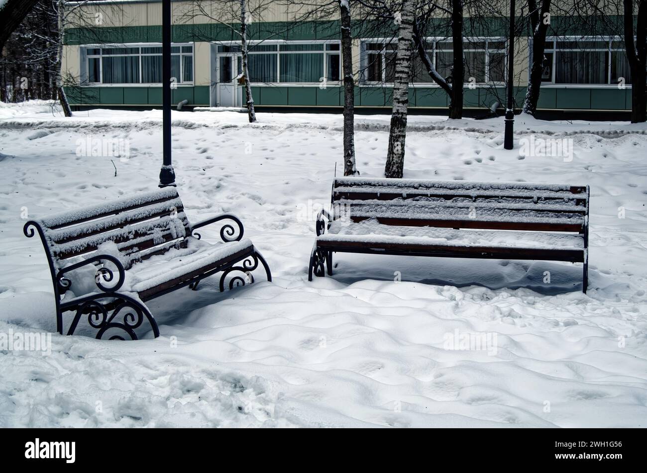 Outdoor bench in the snow in the park, Moscow Stock Photo