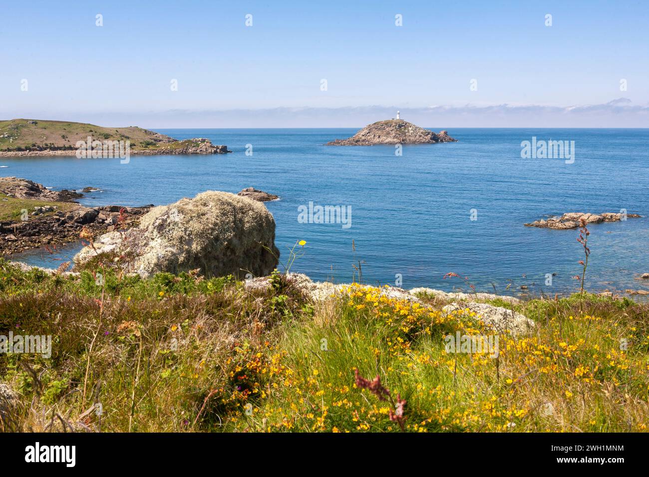 Round Island with its lighthouse, and St. Helen's, from the nearby