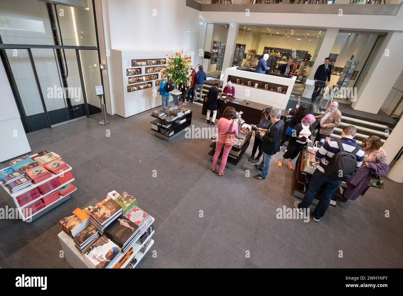 People look around and shop in the museum shop of the famous museum 'Mauritshuis' in The Hague, The Netherlands Stock Photo