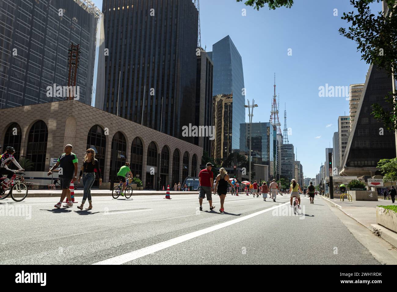 Avenida Paulista in Sao Paulo, on a sunny Sunday, closed for leisure, cycling, rollerblading, walking. No cars, no noise, no pollution Stock Photo