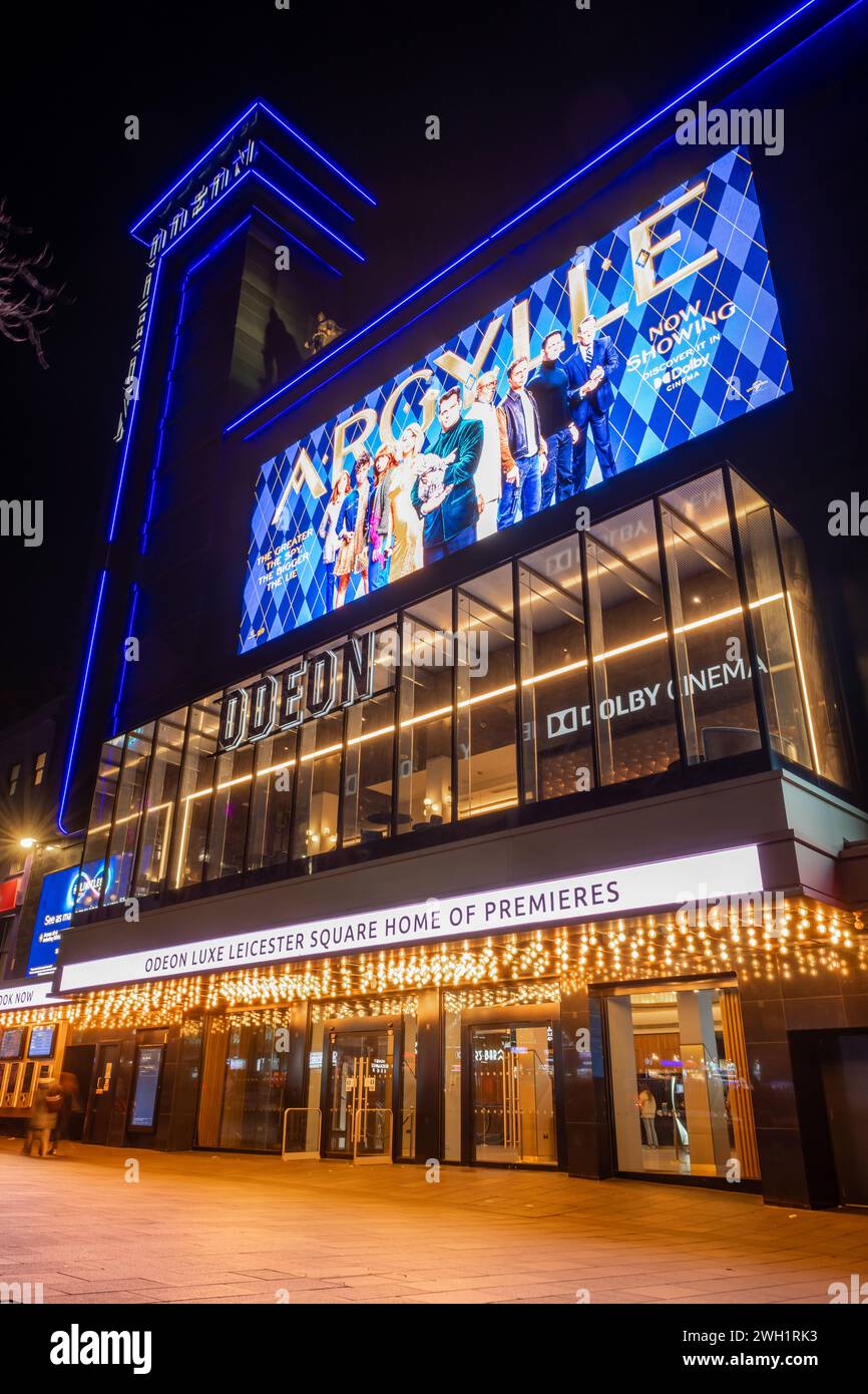 London. UK- 02.04.2024. Exterior night time view of the facade and entrance of the Odeon cinema in Leicester Square. Stock Photo