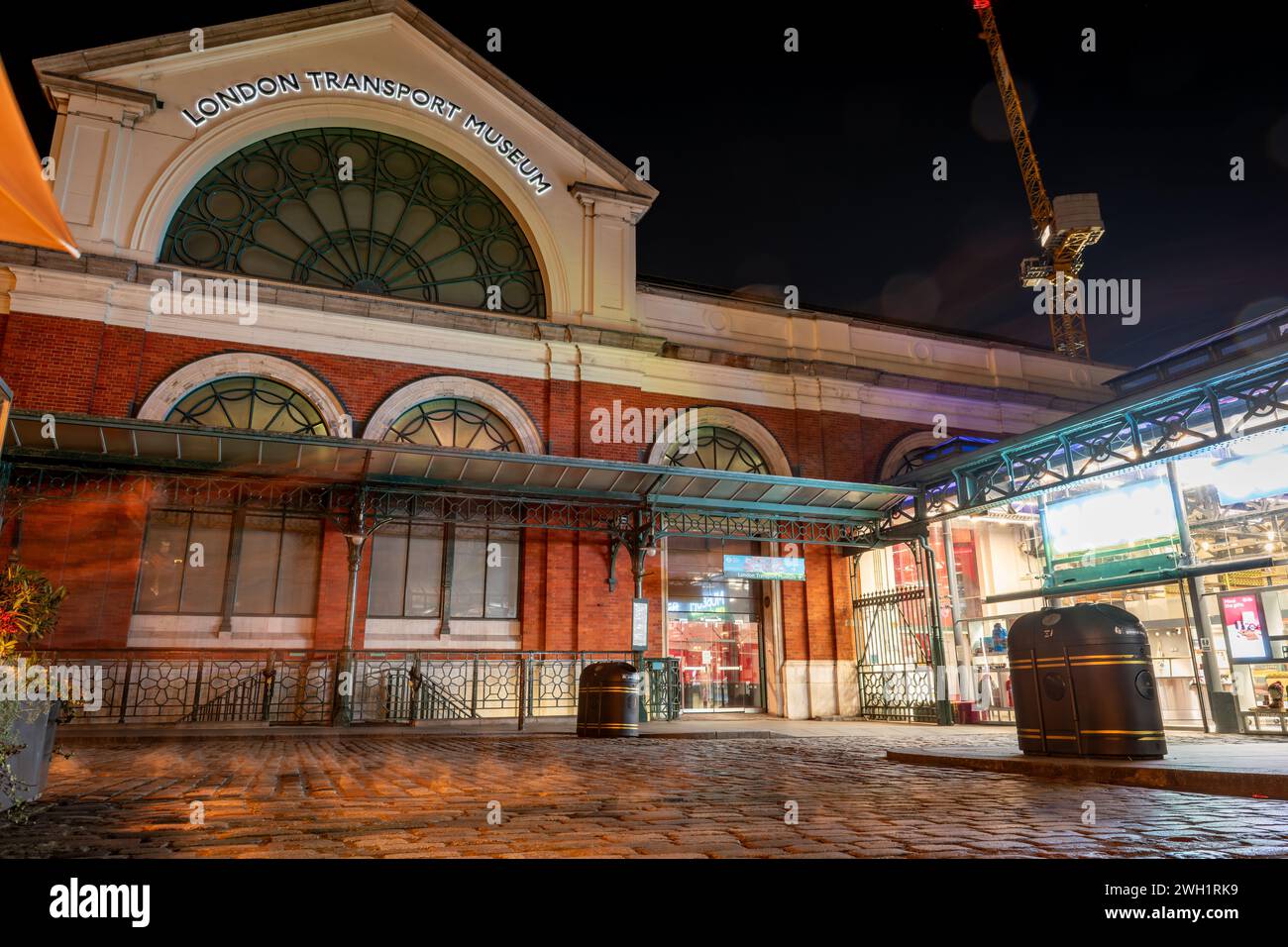 London. UK- 02.04.2024. The name sign and facade of the London Transport Museum at night. Stock Photo