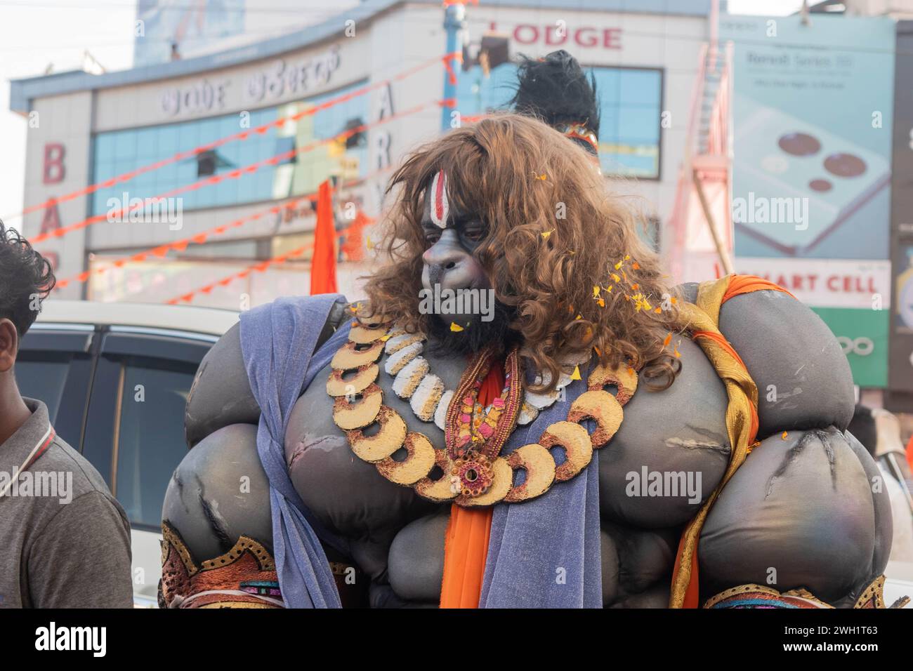 Hassan, Karnataka, India - January 10 2023: Street performers dressed as Hindu mythological characters entertain the crowd during VHP's Shobha yatra f Stock Photo