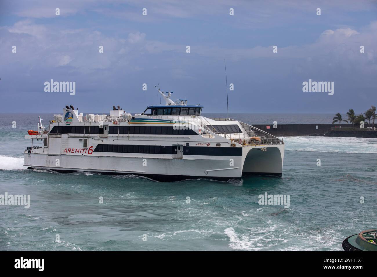 Aremiti 6 which operates in French Polynesia entering Papeete, Tahiti, South Pacific Ocean Stock Photo