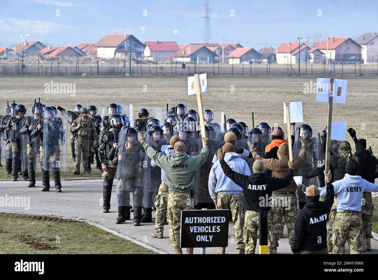 07 February 2024 Bosnia Herzegovina Sarajevo A Demonstration At   07 February 2024 Bosnia Herzegovina Sarajevo A Demonstration At Eufor Camp Butmir On Controlling Mass Riots Shows The Evacuation Of People From A Lot House And The Establishment Of External Security Eufor Soldiers Are Stationed In Lot Houses Lot Stands For Liaison Observation Team Throughout The Country To Maintain Contact With The Population Soldiers Act As Police Officers And Demonstrators Photo Soeren Stachedpa 2WH1XWX 