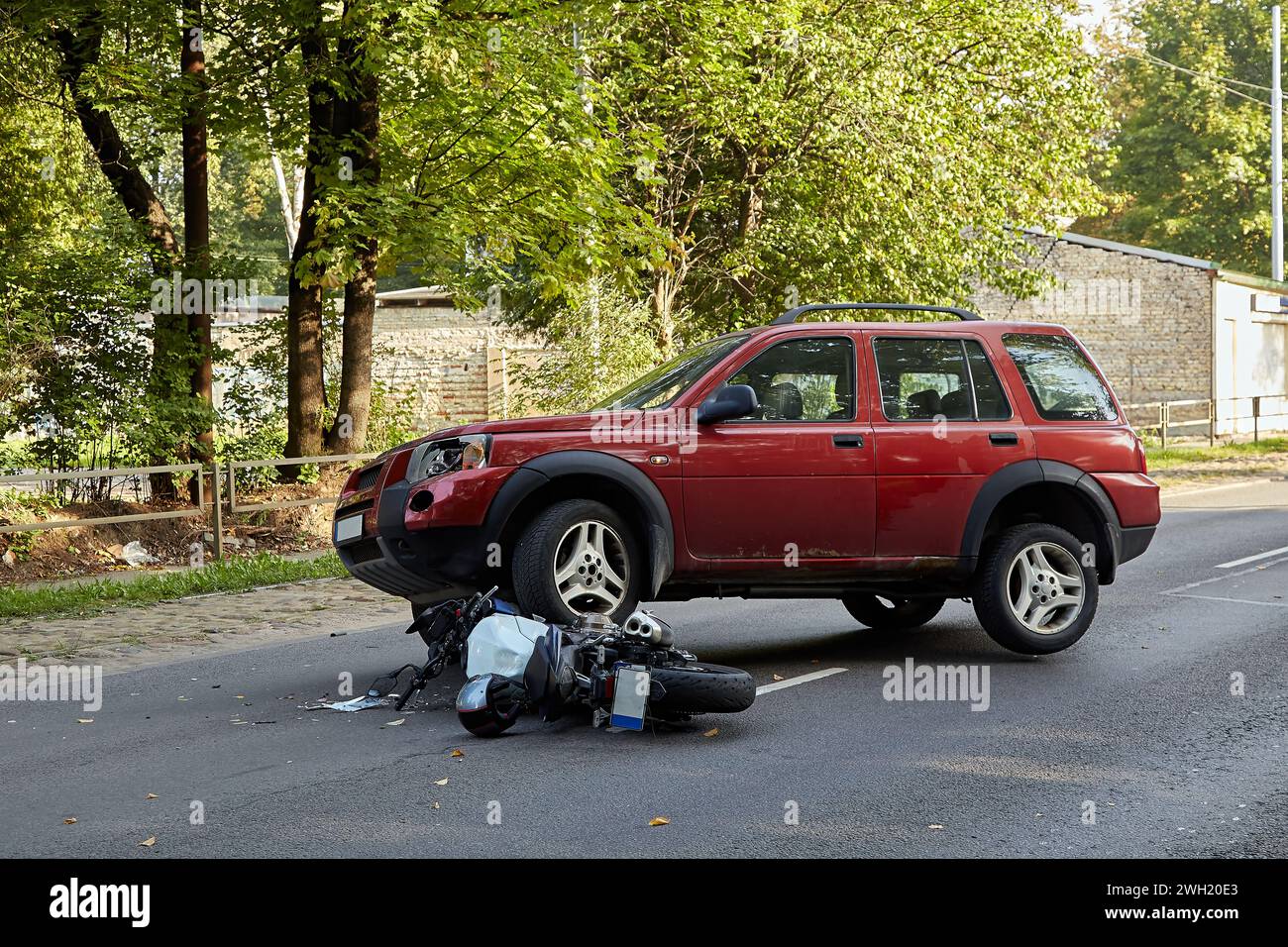 September 13, 2023, Riga, Latvia, damaged car and motorbike on the city ...