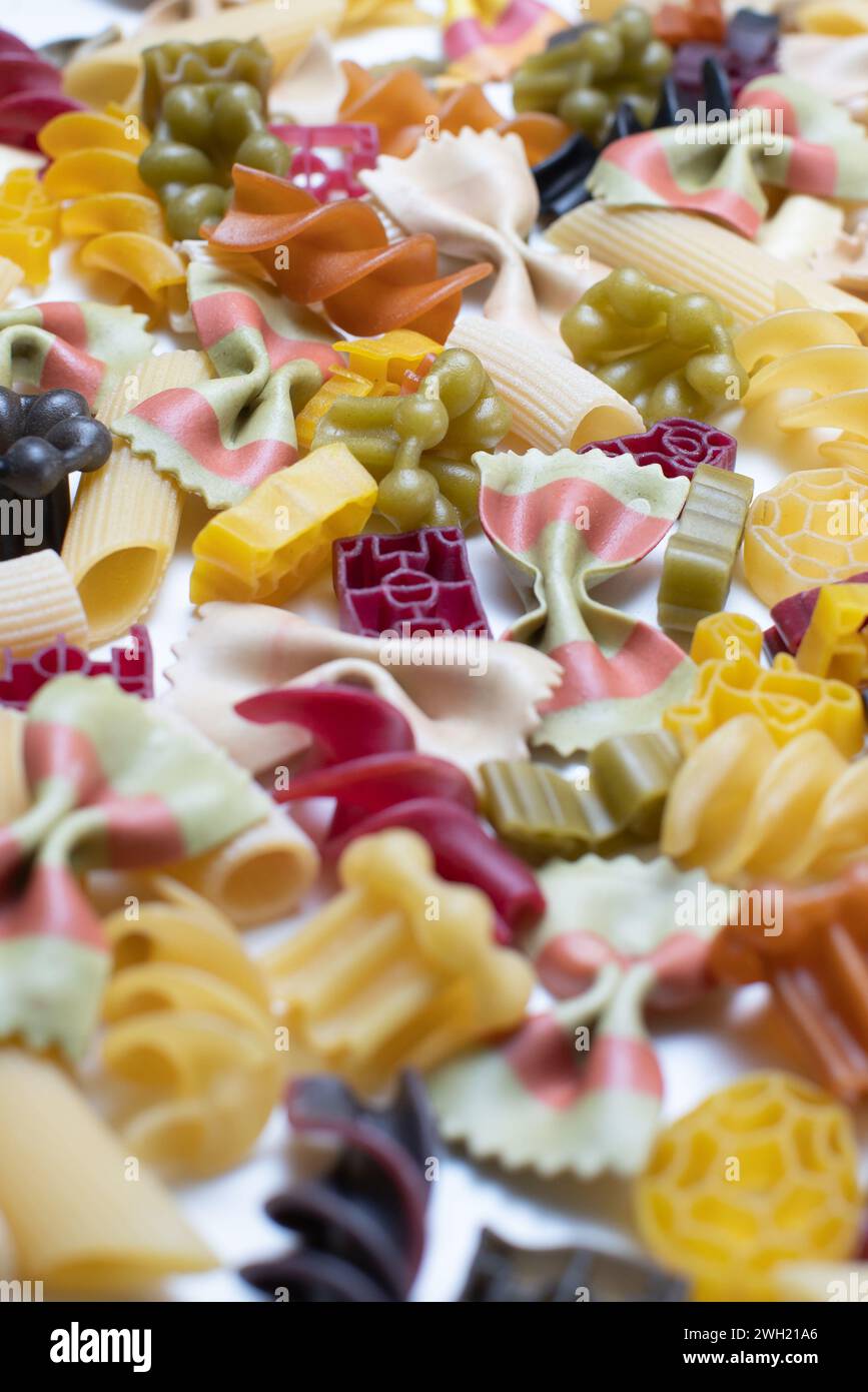 various types of pasta on white surface Stock Photo