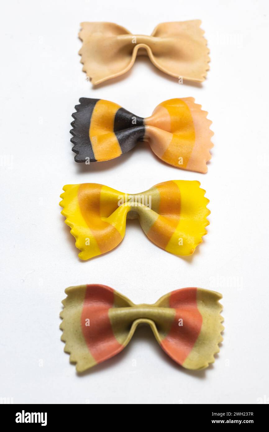 bow tie pasta isolated on white surface Stock Photo