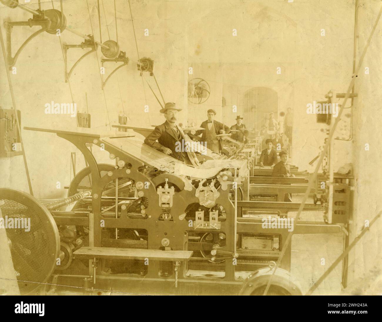 Workers of a printing house at work, Italy 1900s Stock Photo