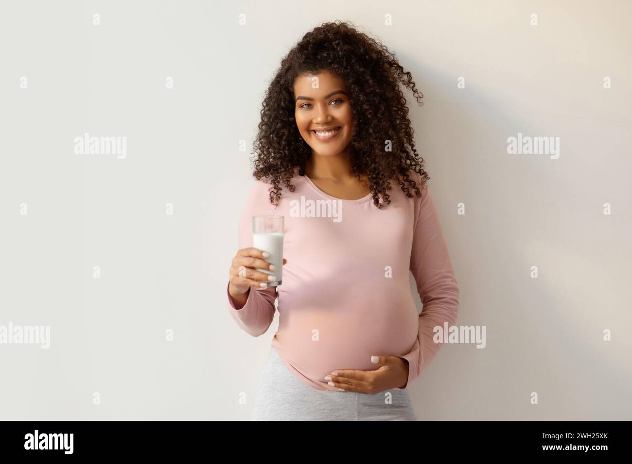 Pregnancy Nutrition. Portrait Of Black Smiling Pregnant Woman With ...