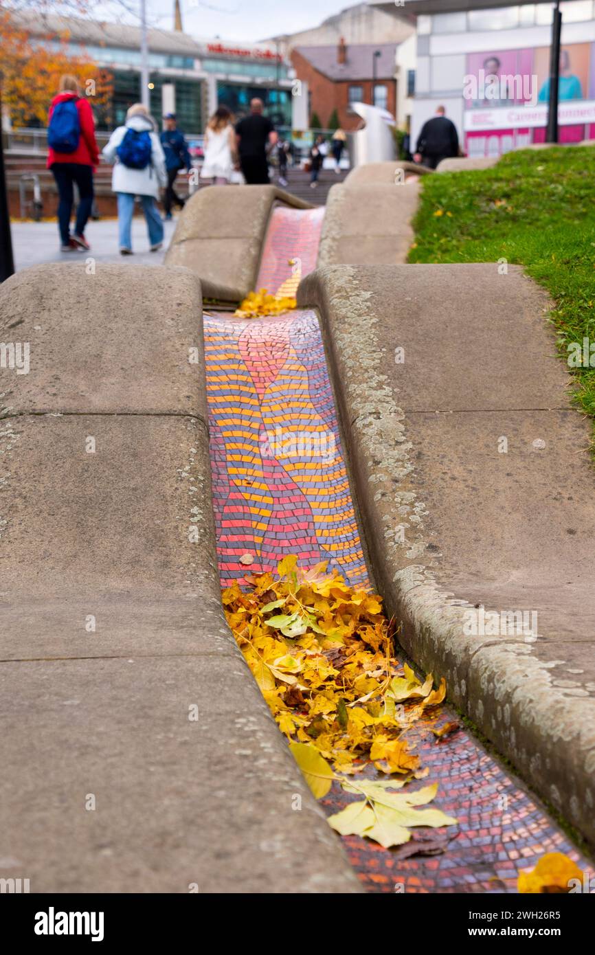 Sheffield Water Rill Sheffield UK – 13 Nov 2021: Fallen autumn leaves gather in the dry ...