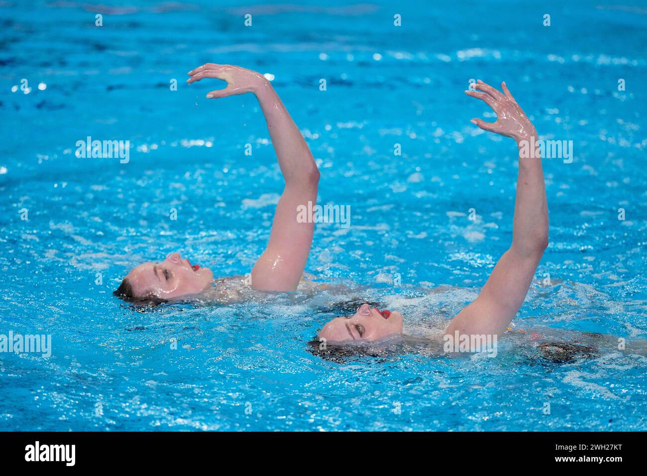 Maryna Aleksiiva and Vladyslava Aleksiiva of Ukraine compete in the