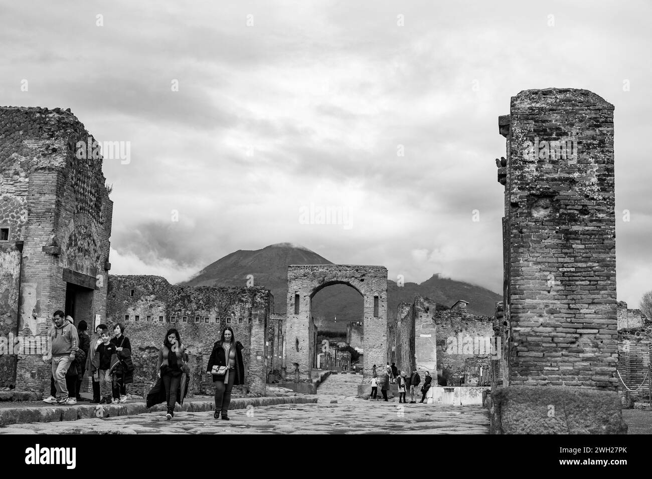 Visiting the city of Pompeii that was covered with volcanic ashes after the eruption of Mount Vesuvius, touristic places in Italy. Stock Photo
