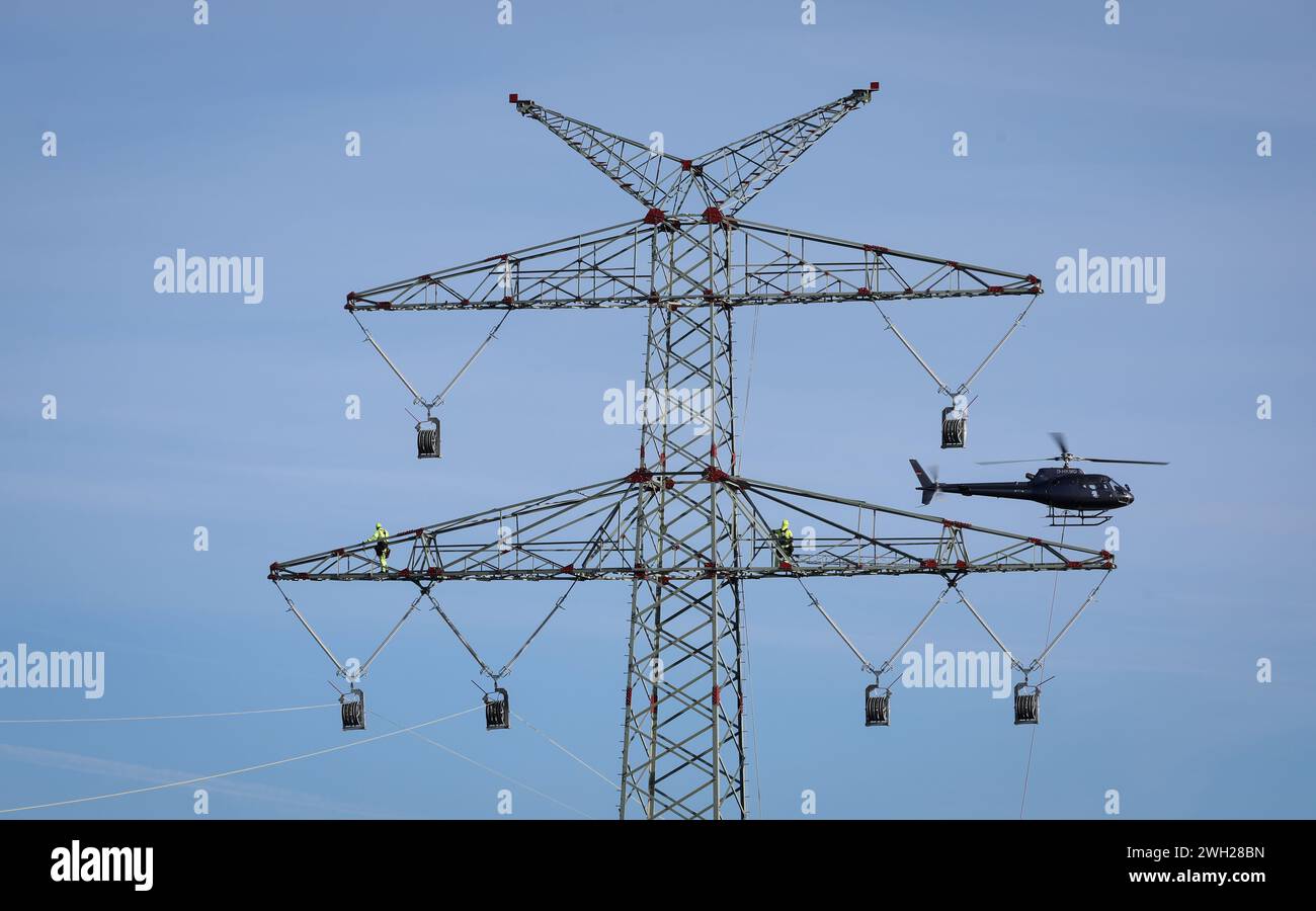 07 February 2024, Schleswig-Holstein, Pöhls: A helicopter flies between ...