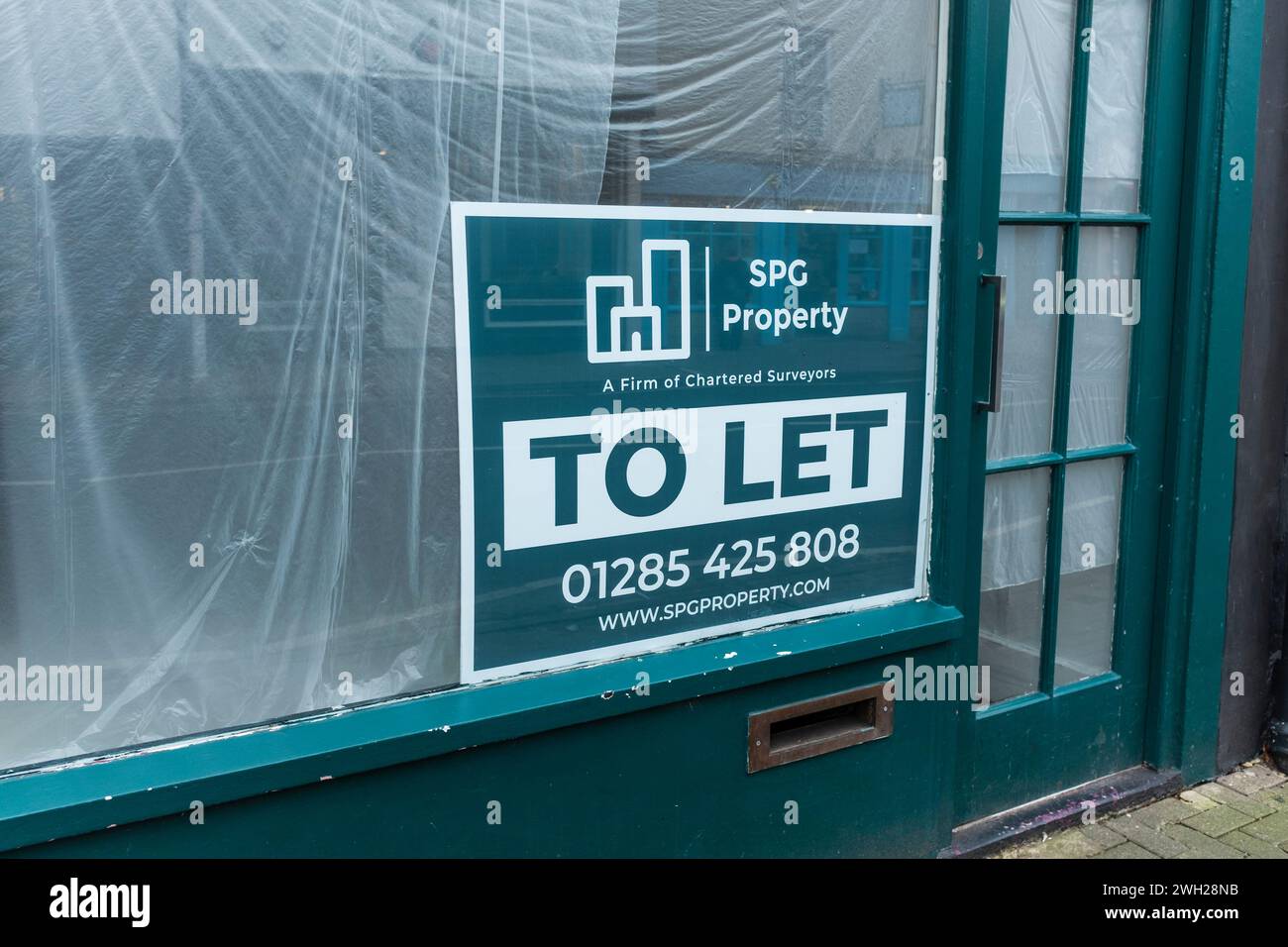 Closed down shop to let sign, Tetbury, Gloucestershire, UK Stock Photo